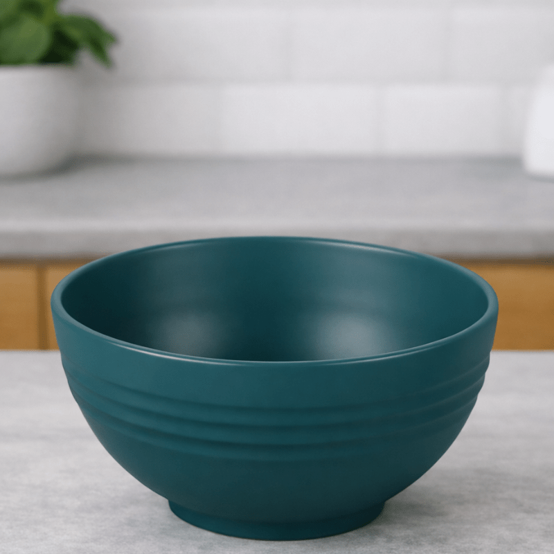 Dark Green wheat straw cereal bowl on a neutral background